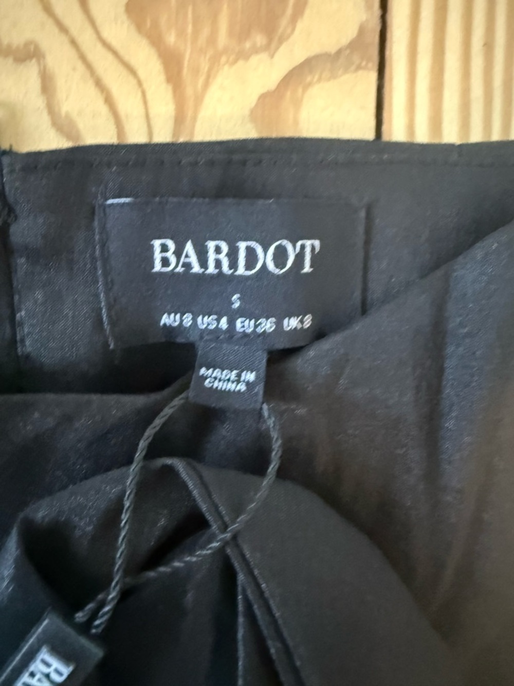 Bardot Carson Black Draped Mini Skirt with Rosette Sash - Picture 7 of 8